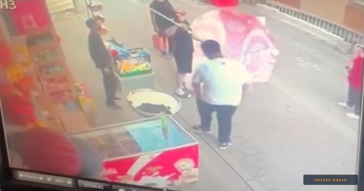 8. Kattan Düşen Minik Canı Şemsiye ile Havada Yakaladı: Kahraman Marketçiden Mucize Kurtuluş